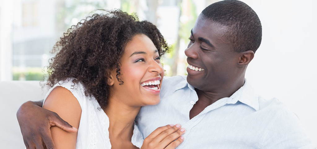 black couple laughing