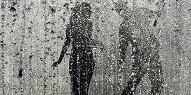 Malagasy Proverb on Being in Love black-couple-in-rain