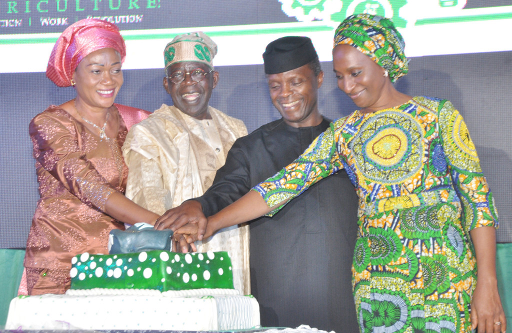 L-R, Sanator Remi Tinubu, Asiwaju Bola Ahmed Tinubu, Vice President Yemi Osinbanjo and wife of the vice president Mrs. Dolapo Osinbanjo cutting the cake to mark the 8th Bola Tinubu Colloquium to mark the 64th birthday of Asiwaju Bola Ahmed Tinubu