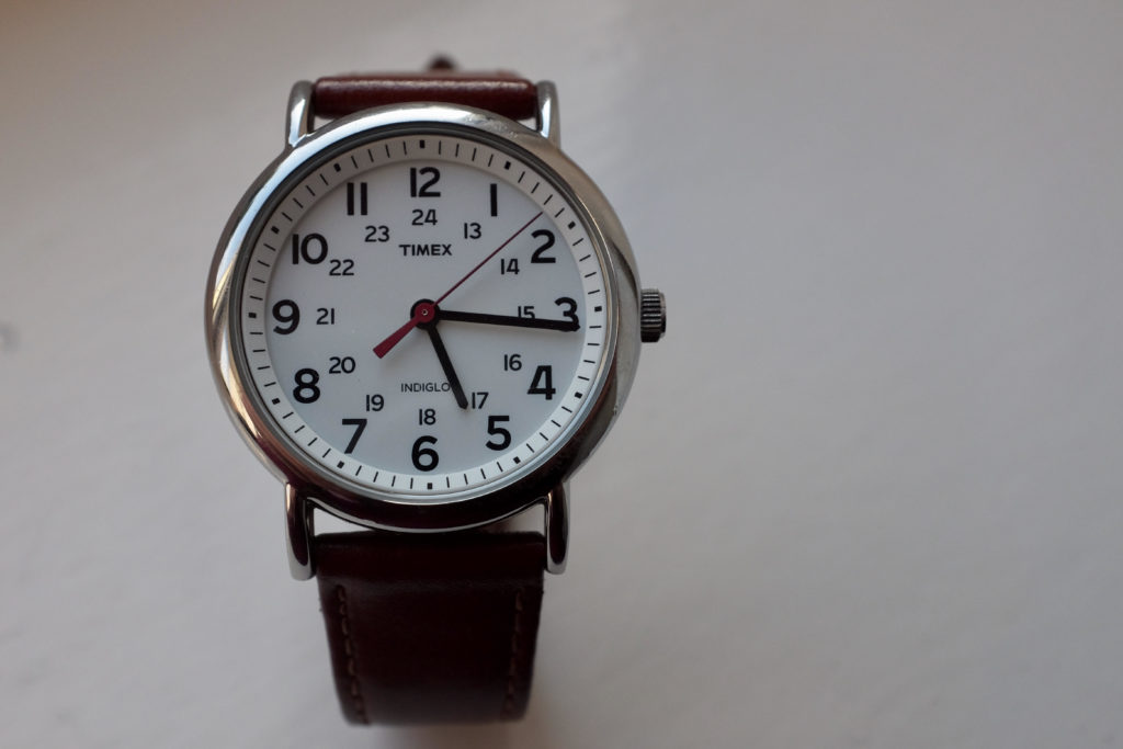 NOW IS THE RIGHT TIME Timex "field watch" with leather band.