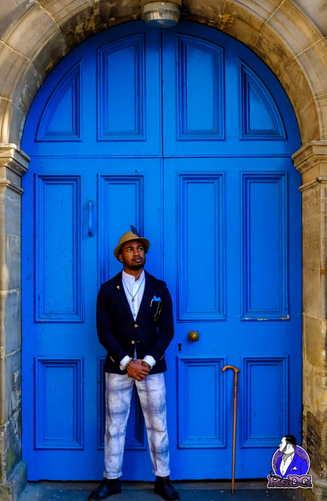 Pride Nigeria Magazine's Rare and Debonair Gentleman, Mary Olan Photography, Chukwuemeka Ayiam-Osigwe Nigerian Male Fashion blogger, what to wear to a boat regatta, how to wear a navy blue blazer, how to wear chukka chukkar boots stylishly, 6 pairs of shoes every black coloured man needs and why, the desert boot vs the chukka boot what are their origins similarities and dissimilarities ?